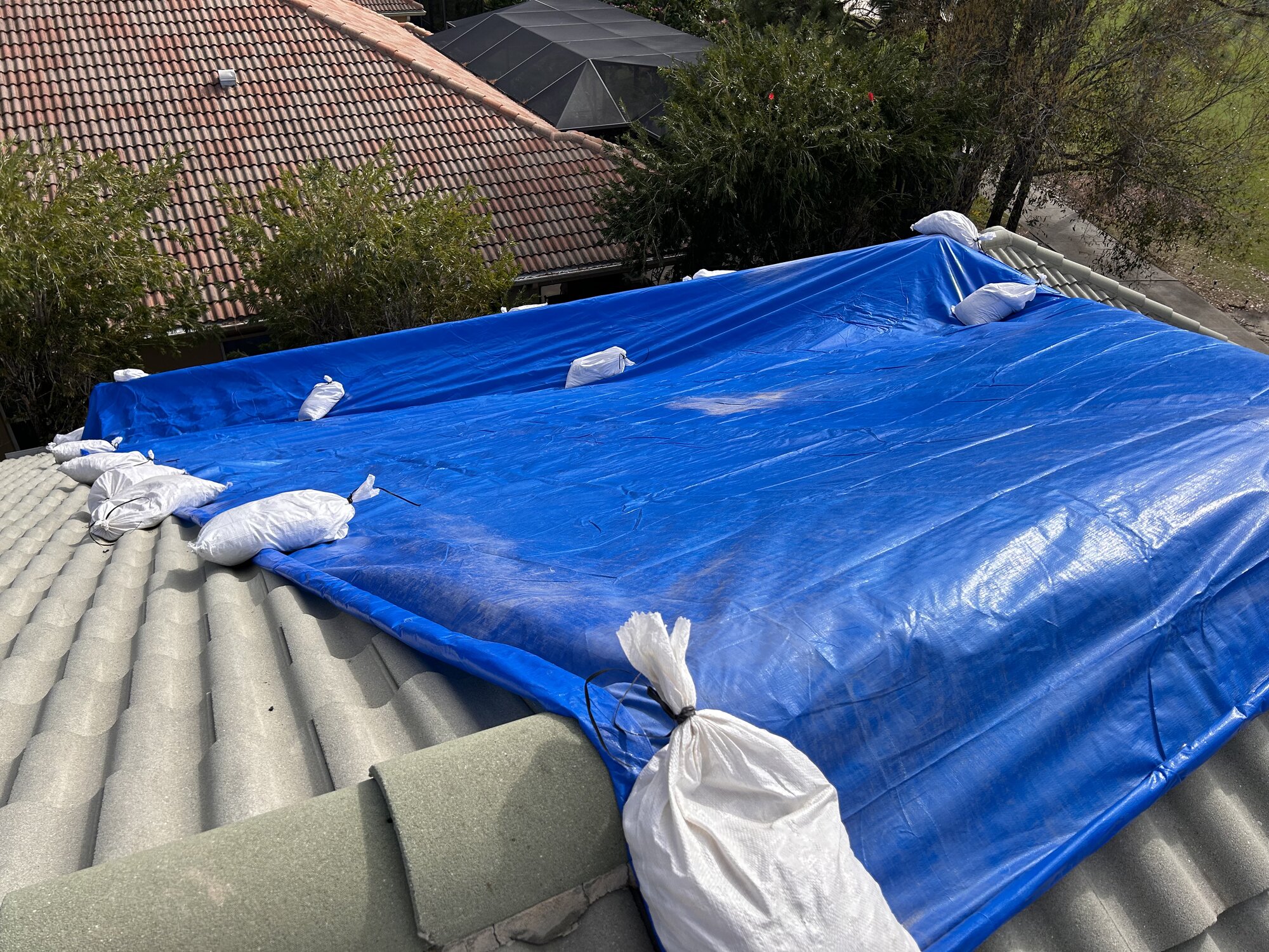 Professional roof protection - property insurance verification photos