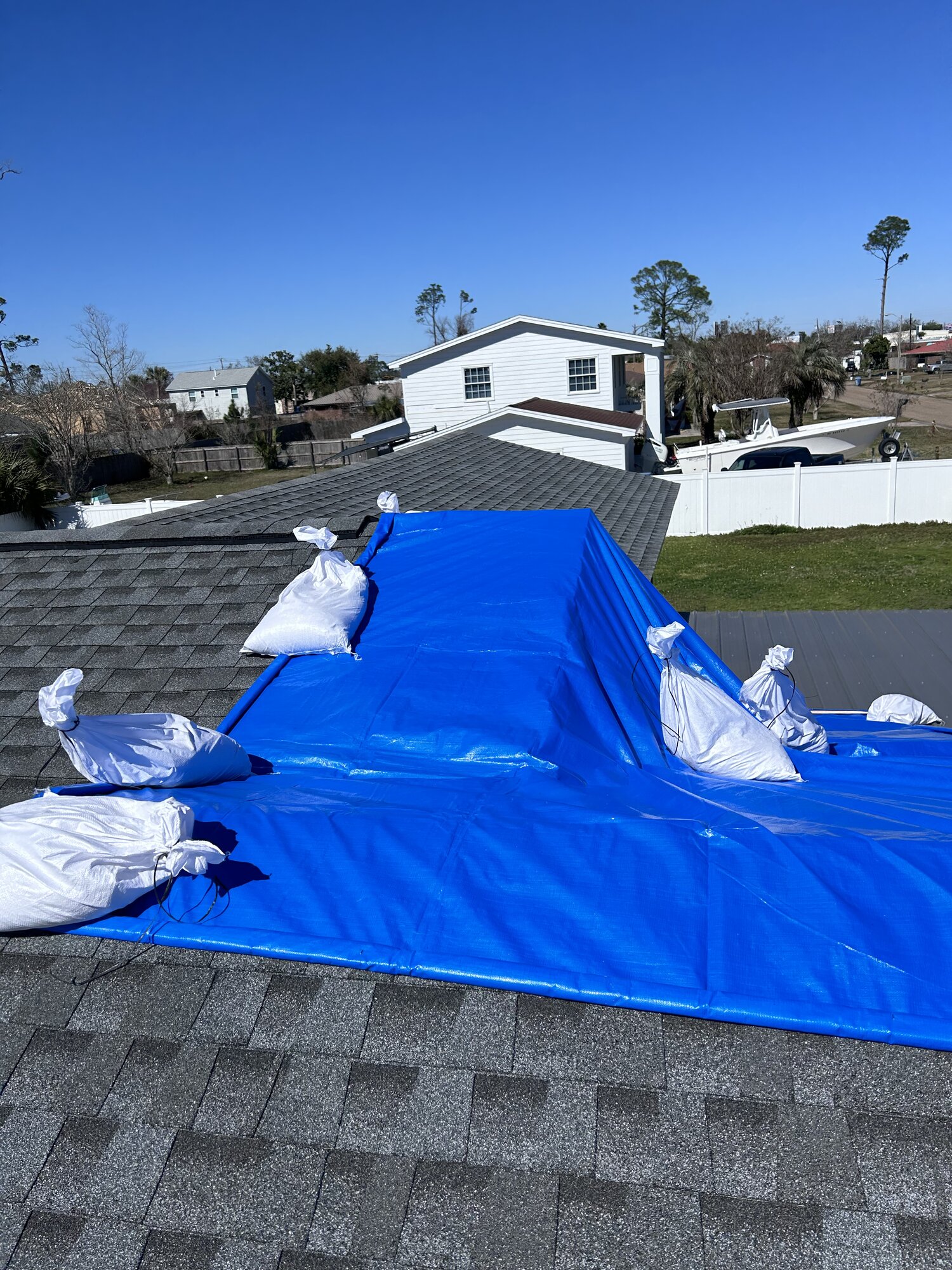 Professional tarping installation - insurance carrier approved photos