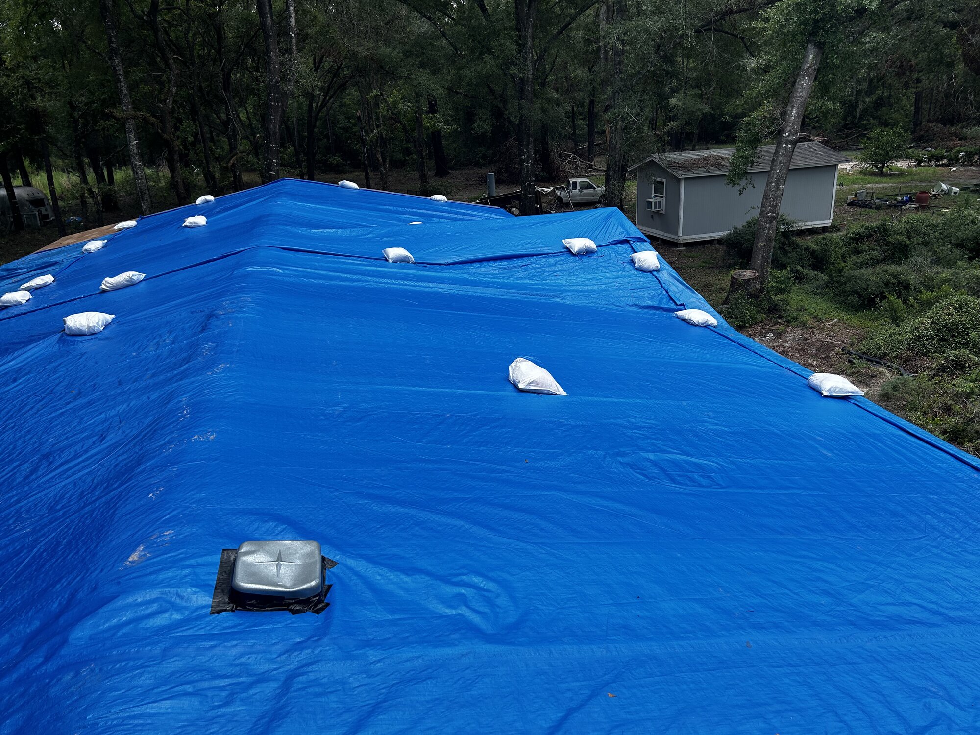 Catastrophe response tarping - insurance adjuster verification imagery